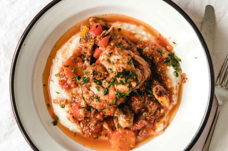 Chicken cacciatore with chicken thighs, vegetables and polenta