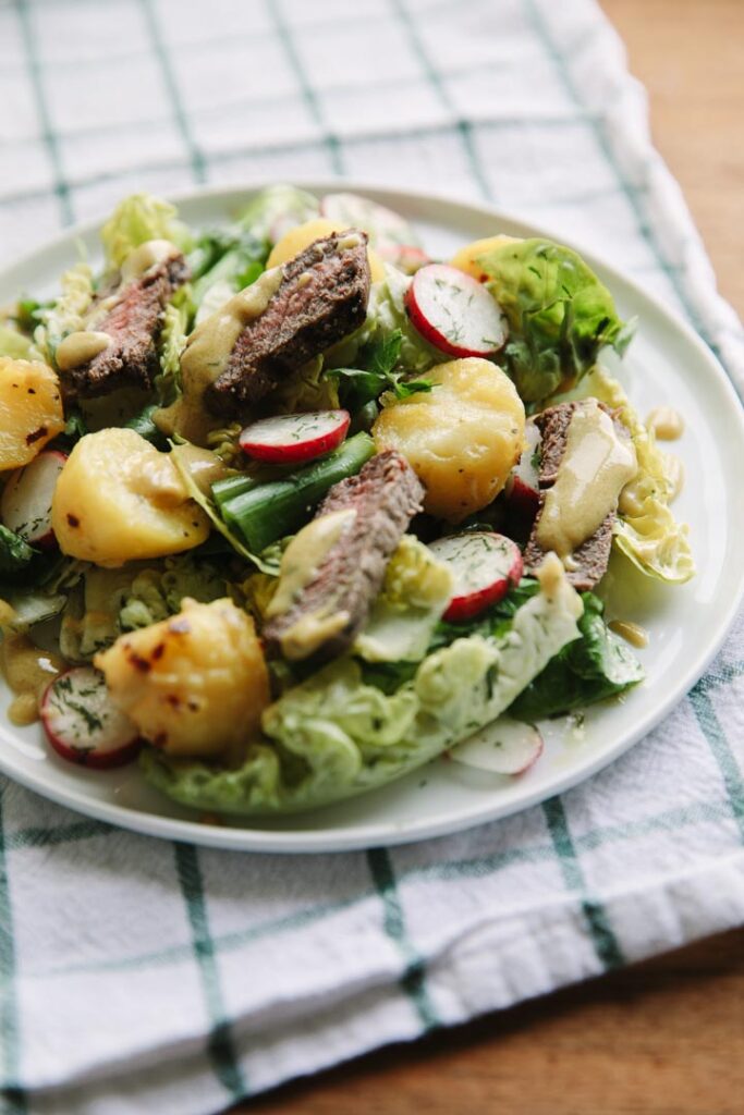 Sirloin, garlic potatoes and radish salad